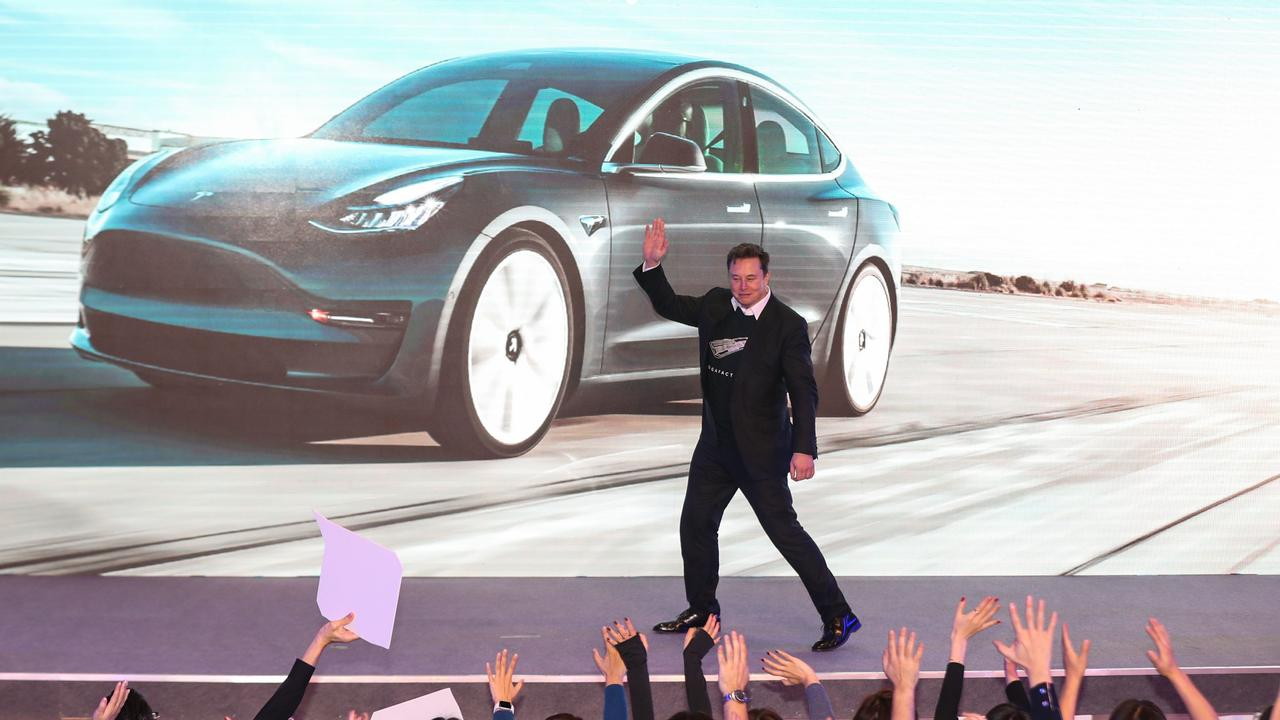 Elon Musk presenting Tesla on stage